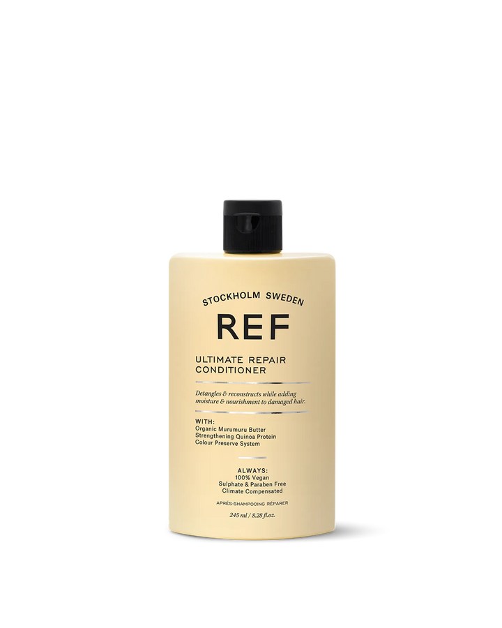 Official REF Stockholm front product shot of the Ultimate Repair Conditioner (245ml) bottle on white background, full label visible.
