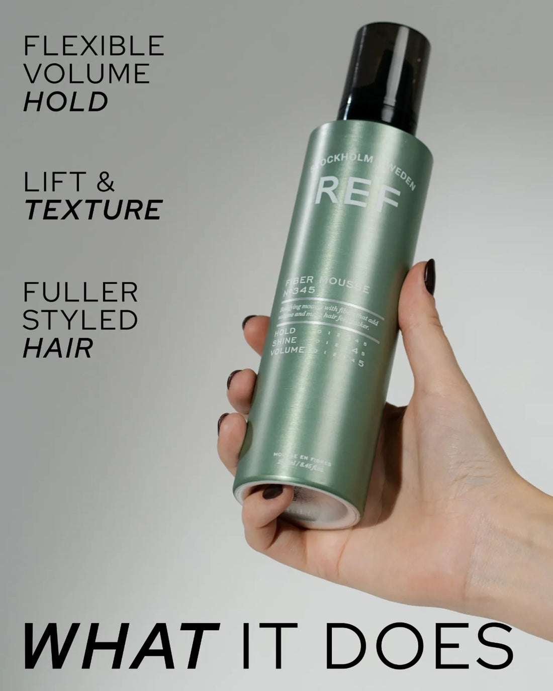 Official REF Stockholm lifestyle/in-use photo: a hand holding the green Fiber Mousse N°345 can, from the 'What It Does' marketing tile on the official product page (refstockholm.com).