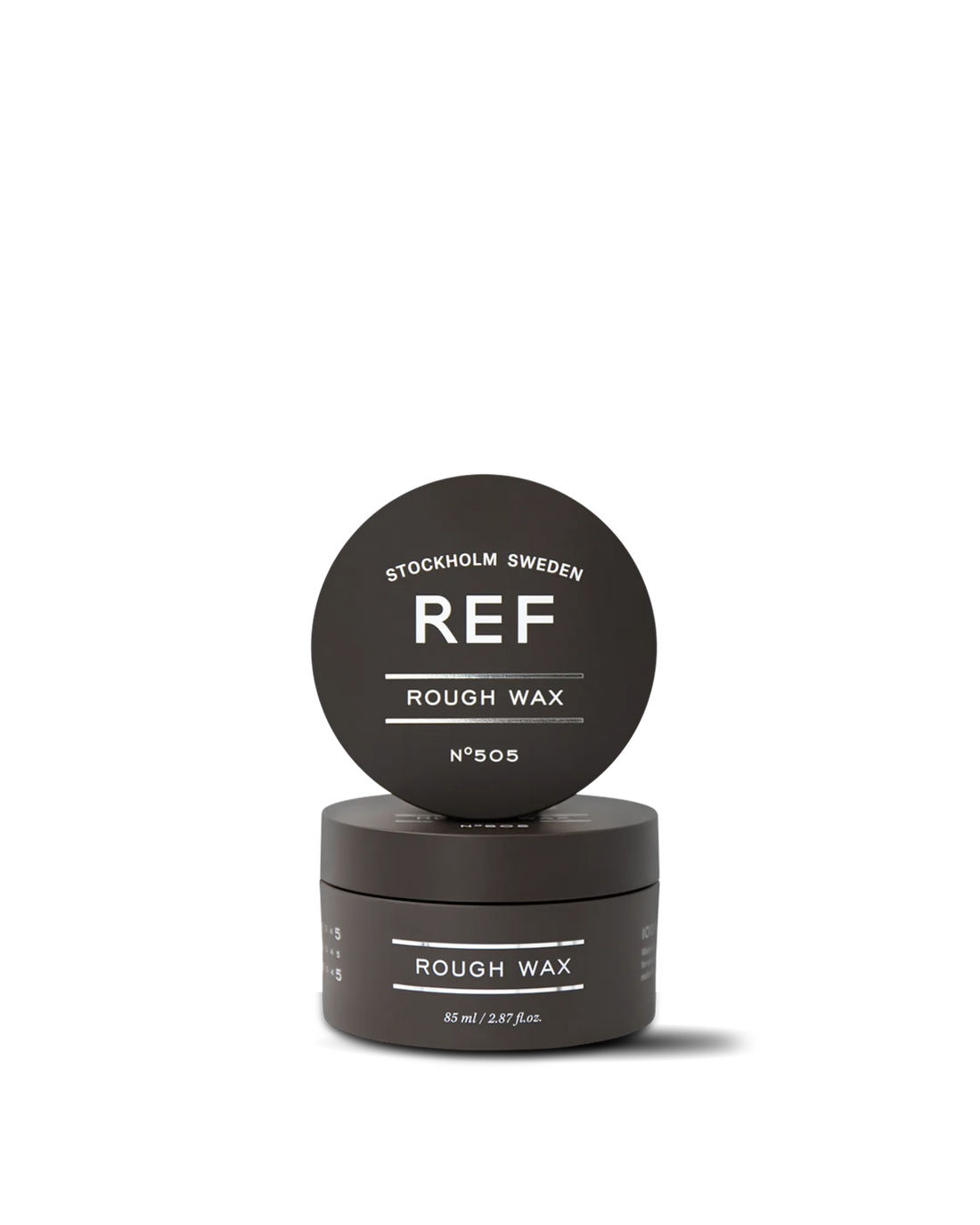 Official REF Stockholm front/hero product shot of Rough Wax N°505 (85ml) — studio photo of the matte dark jar with its lid propped on top, showing 'REF STOCKHOLM SWEDEN / ROUGH WAX / N°505' branding. Sourced directly from refstockholm.com's own product page (used as its canonical og:image); verified HTTP 200 and confirmed identical to the image used by authorized REF distributors.